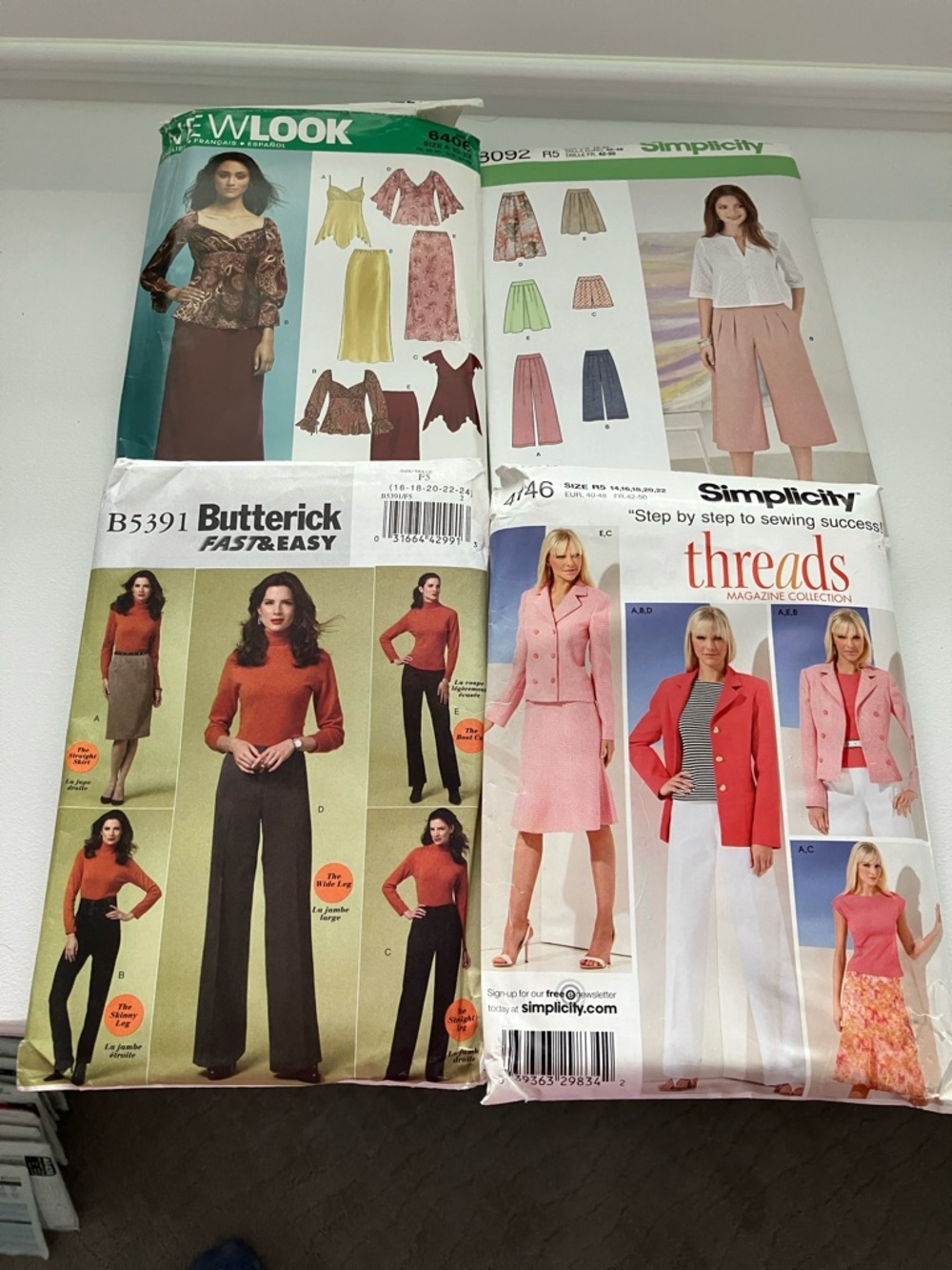Four uncut sewing patterns women’s sizes 10–24